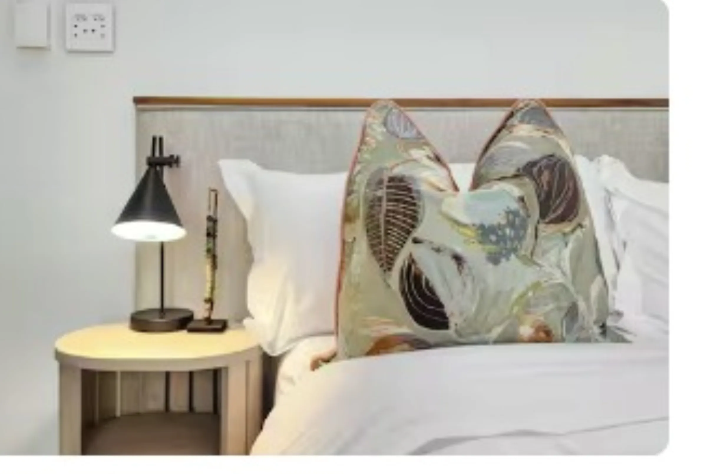 Bedroom 2 — Linen headboard with reading nook