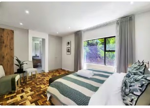 Bedroom 5 — Parquet floors and garden light